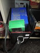 A case of camera equipment and accessories including a boxed Olympus OM10 and 50mm F1.8 lens and a