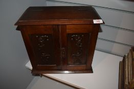 A Late Victorian arts and crafts Pipe smokers cabinet, having fitted interior, copper panelled