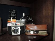 A selection of cameras including Kodo Model C and King Penguin
