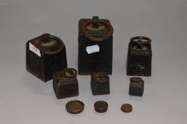 A set of graduated cast kitchen scale weights