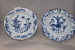 A pair of Chinese export porcelain plates decorated with delft designs