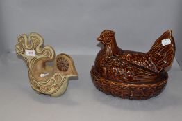 A ceramic hen styled egg nest by Portmeirion and similar figure