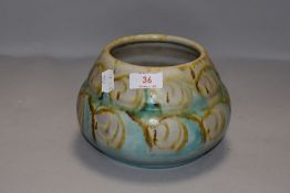 A studio pottery vase of squat form by Royal Lancastrian bearing mark E T R