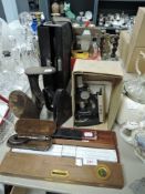 A miscellany of items amongst which are a vintage micrometer and level, cobblers last,microscope and
