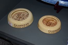 Two advertising ashtrays for Guinness by Ashtead potteries