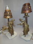 Two lamps having classically styled figurines to marble or similar bases.AF