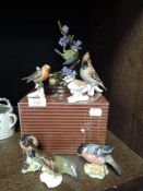 A selection of bird figures and figurines including Goebels and Beswick etc