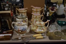 A mixed lot of early 20th century Graded jugs, a set of fish servers, biscuit barrel and teapot.