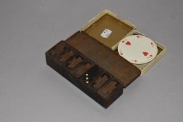 A set of Rondo circular playing cards and a set of Wills Capstan dominoes
