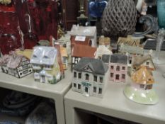 A variety of cottage studies including Lilliput lane.