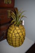 A mid century cocktail bar ice bucket in the form of a pineapple.