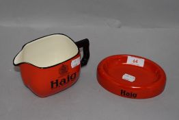 An advertising decanter and tray set by Haig Whisky