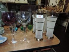 A selection of art glass and cocktail glasses having frosted bowls