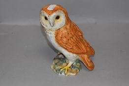 A figure study of a barn owl by Beswick