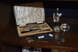 A well presented manicure set in case and similar silver plated items