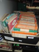 Two boxes of penguin novels.