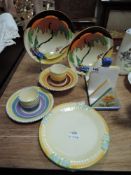 A selection of art deco styled ceramics including two Clarice Cliff bowls decorated in the