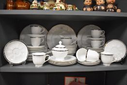 A part Andrea Fontebasso porcelain dinner service having silver gilt banding to edges and