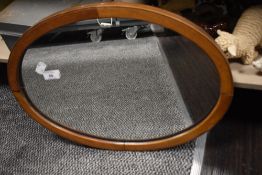 An early 20th century mahogany framed mirror.