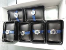 Six boxed ladies Cosmopolitan wrist watches, all same design with blue straps