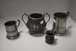 Two pewter tankards or mugs and a similar twin handled bowl