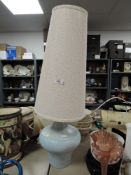 A mid century style Italian lamp base in egg shell blue glaze