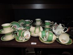 A part tea service by Crescent and a similar coffee servce