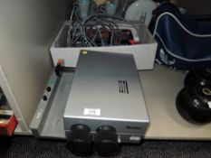 A vintage Rollei slide projector and accessories, untested.