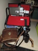 A pair of Denhill binoculars a Pacemaker super 8mm camera and Scramble arcade game