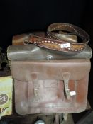 Three leather satchel style bags and a tooled leather belt