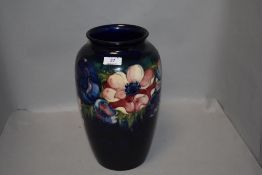 A large 1940/50's Moorcroft Pottery oviod-form vase, tube-lined in the anemone design against a