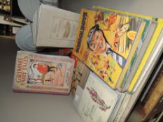 A mixed lot of vintage books including childrens annuals and a selection of cigarette cards in