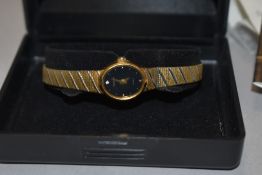 A ladies Accurist gold tone wristwatch, slight damage to bracelet