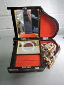 A Piano shaped jewellery box with oriental decoration includes costume jewellery