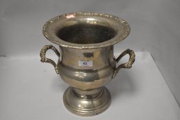 A modern silver-plated Campana urn-form ice bucket/wine cooler