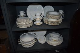 A large part dinner and tea service by Royal Albert in the Val D'or design