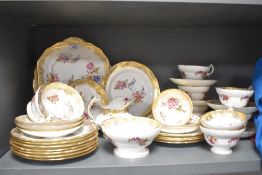 A Hammersley & Co floral and gilt tea service, printed factory marks to base.