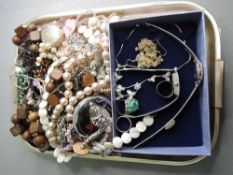 A small selection of costume jewellery including necklaces, two wrist watches, earrings, rings etc