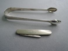 A small fruit knife having HM silver blade and a pair of HM silver sugar nips
