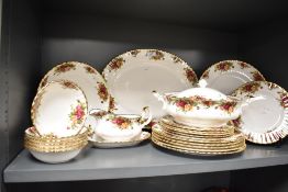 A quantity of Royal Albert 'Old Country Roses' dinner wares, to include plates, tureen,