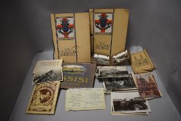 A collection of vintage postcards,two copies of the league journal and similar album.