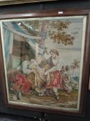 A large vintage framed pictorial needlepoint depicting religious scene.