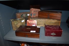 An assortment of vintage and antique tins and wooden boxes also a travelling money box.