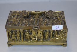 A modern reproduction cast-brass reliquary box, of hinged rectangular form.