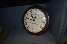 A modern 'The Famous Grouse Finest Scotch Whisky' advertising circular wall clock