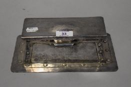 An Arts and Crafts plated metal two division desk-top inkstand, of riveted construction with