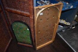 A vintage pin football and a bagatelle.