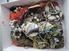 A small selection of costume jewellery necklaces etc