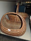 Two wicker woven baskets in traditional designs