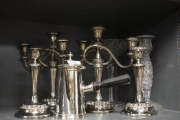 A silver-plated hot chocolate pot with ebonised side handle, a pair of silver-plated